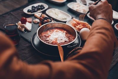 People use a fork to pick food
